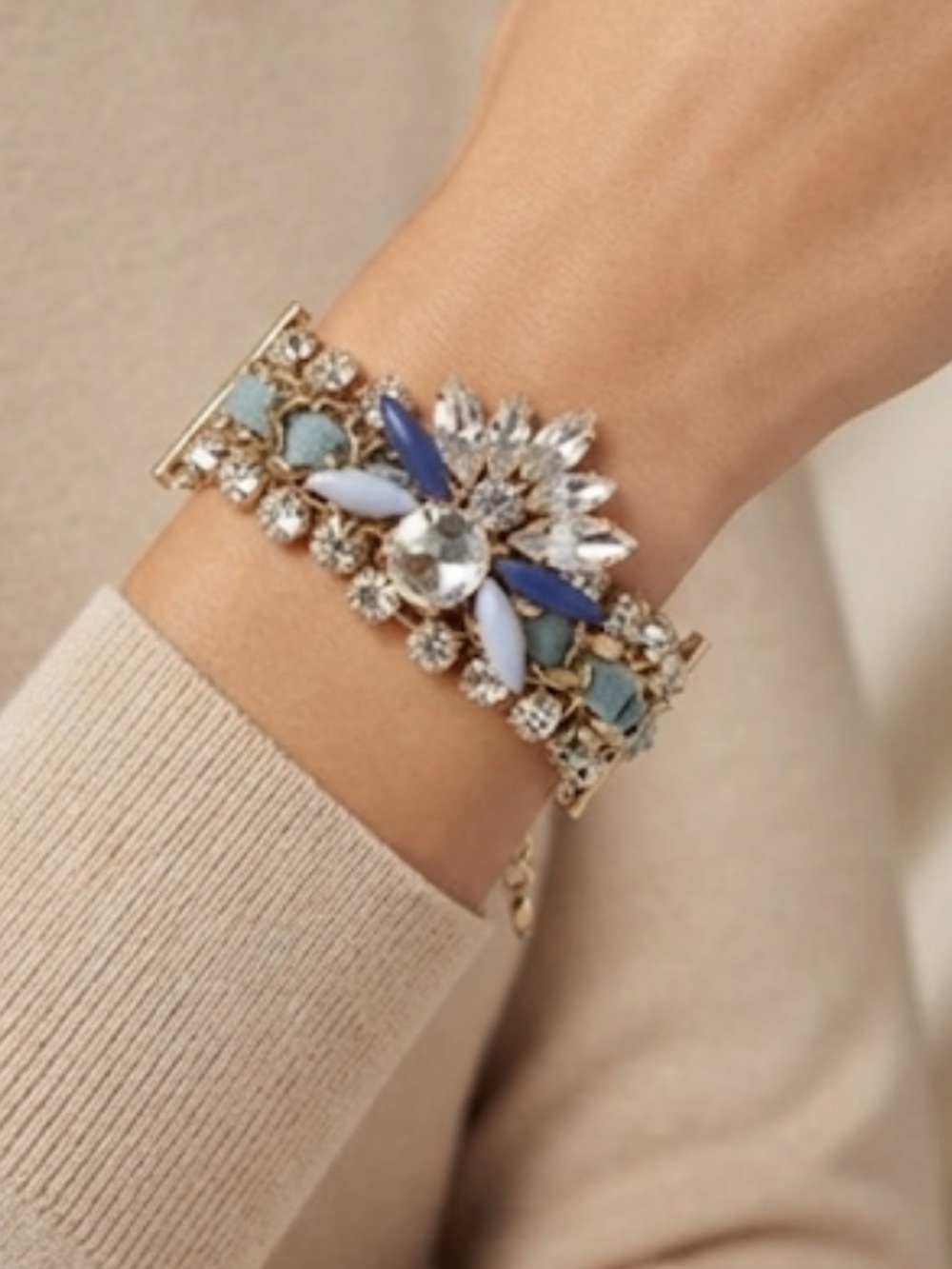 Gold-Tone Bracelet with Blue Ribbon and Crystal Floral Accent